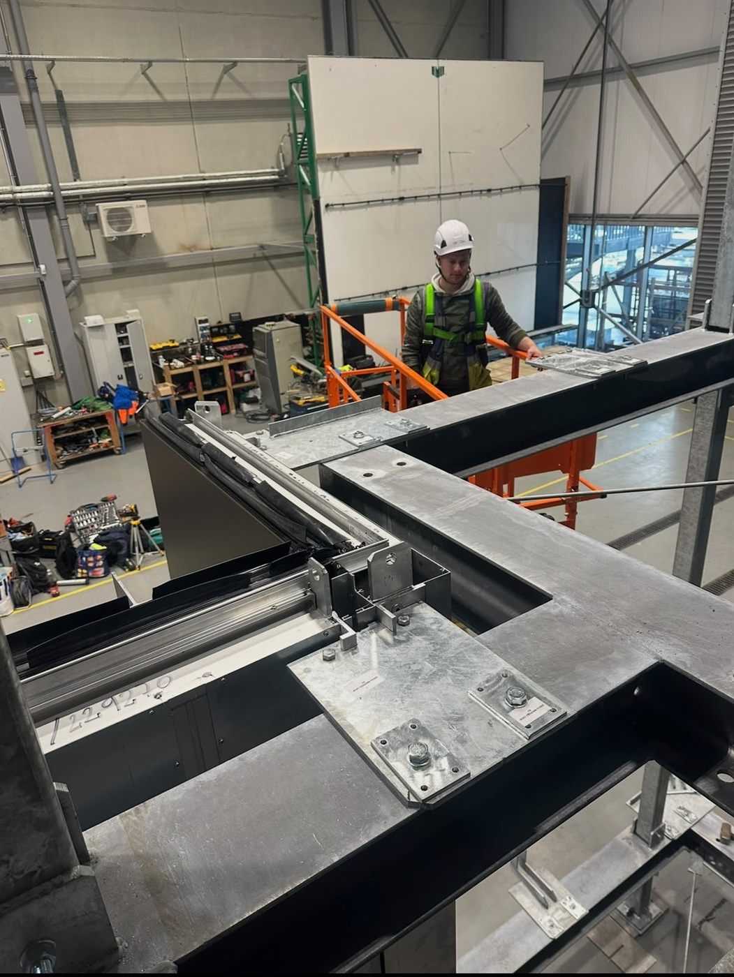 Operative preparing steel and aluminium framing in the workshop